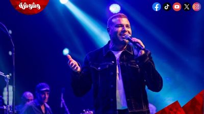 رامي صبري يرفع الوشاح الفلسطيني في حفله بالولايات المتحدة الأمريكية (صور)