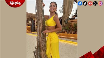 مي سليم تخطف الأنظار بإطلالة صيفية جريئة بالأصفر على شاطئ البحر