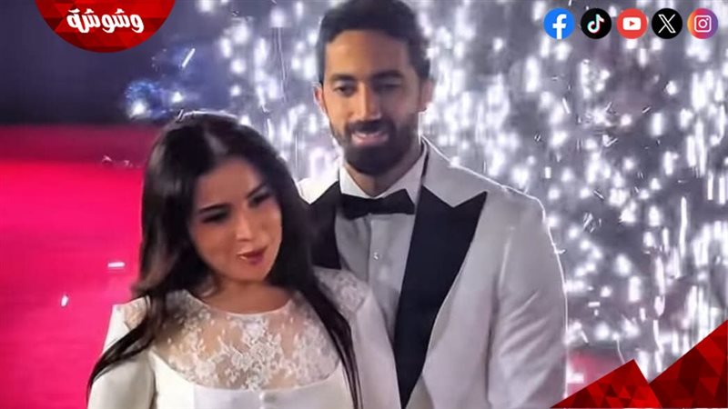 مي عز الدين وزوجها